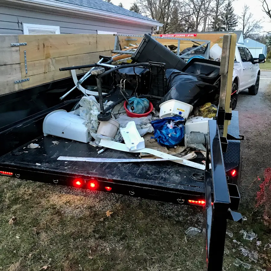 Roll-off dumpster delivered to a residential driveway in Bartow